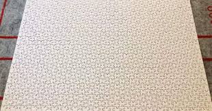 I sat there with my brother as we passed puzzle pieces of abstract black and white splotches on solid green back and forth, only matched by sheer luck. Amazon Is Now Selling A 1000 Piece All White Impossible Puzzle For 20 And It Looks Like A Cruel Joke Bored Panda