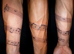 Pin By Style And Designs On Screenshots Tattoos For Guys Music Staff Tattoo Music Tattoos
