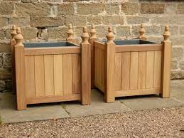 For your consideration a pair of stone encrusted planters, reminiscent of the grotto at. Wooden Planters
