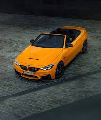 Bmw F83 M4 Convertible Edition 30 Jahre In Mandarin Ii Bmw M4 Bmw Bike Trips