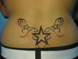 Pin By Yineth Romero On Tattoos Piercings Tramp Stamp Tattoos Cowboy Tattoos Star Tattoos
