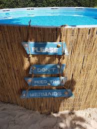 Intex Frame Pool Transformation Please Don T Feed The Mermaids Above Ground P Dont Feed Frame Ground Intex Me In 2020 Pallet Pool Pool Signs In Ground Pools