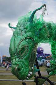 They recycle, conserve water and fuel, and make other choices that not only lessen their impact on the environment but also support industries that are working towards being more environmentally responsible. Plastic Bottle Dragon Bike Waste Art Plastic Bottle Art Recycle Sculpture
