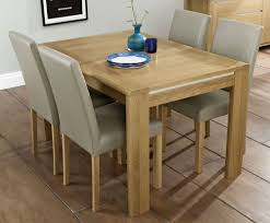 The Petra Oak 128cm Extending Dining Table And Chairs Has A Sleek And Homely Look Comple Contemporary Dining Room Tables 6 Seater Dining Table Oak Dining Sets