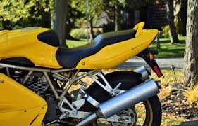 Image result for Nuget Yellow 1999 Motorcycle