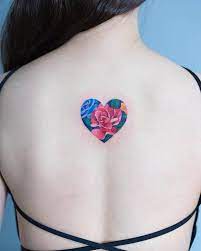 Designs origins meanings of heart tattoos for women. Heart Filled With Flowers Tattoo Tattoogrid Net
