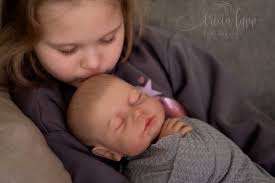 Granddaughter's newborn doll photo session