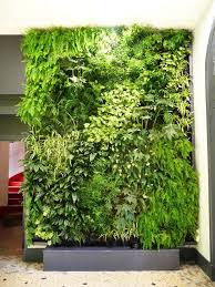 Vertical Garden A Real Sensation Of Being In The Heart Of A Luxuriant Vegetation Vertical Garden Indoor Artificial Vertical Garden Vertical Garden Design