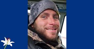 Russell W. Workman, age 35