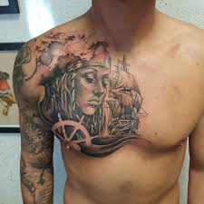 Pirate skull tattoo design idea with banner. 75 Amazing Masterful Pirate Tattoos Designs Meanings 2019