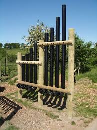 Call Me Crazy But This Would Be A Fun Approach To Creating A Windbreak In The Garden It Could Be Black Like This Ph Outdoor Music Area Music Garden Outdoor