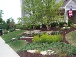 Our goal is to put you in touch with the best landscapers and landscape design companies in your city. Corner Design Outcropping Stone River Birch Aurora Il Front Yard Garden House Landscape Sloped Garden