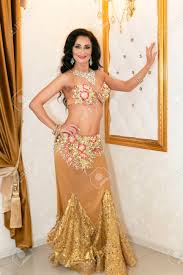 I serve upscale gentleman only. Oriental Dancer In A Golden Dress Woman Brunette Belly Dancer Stock Photo Picture And Royalty Free Image Image 136087002