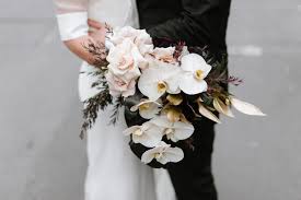 {cascading phalaenopsis bouquet by cathy cowgill flowers, photo by aruna b. Trend Alert Modern Orchid Wedding Ideas One Fab Day