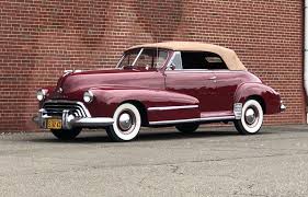Image result for Trojan Maroon 1939 Oldsmobile