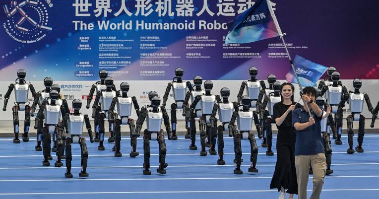 Humanoid robots race and tumble at China's first 'robot Olympics' | Science  and Technology News | Al Jazeera