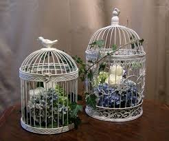 Birdcage Decor Bird Cage Ideas Birdcage Centerpieces With Hydrangea And Roses Bird Cage Decor Bird Cage Centerpiece Bird Cage Centerpiece Wedding