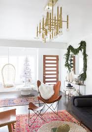 Spacious Living Room With A Leather Butterfly Chair An Oriental Rug A Beautiful Golden C Living Room Modern Oriental Rug Living Room Casual Living Room Decor