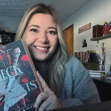 🦁 The Lion and the Deathless Dark, the next book in the Crowns of Nyaxia  series, is coming August 4, 2026! 🩸 (Please note that the full blurb  contains some hints to