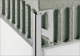 Many of the new porcelain tiles for showers or walls do not come with a prefabricated finished trim piece (bullnose) to trim the edge of a tile shower wall,. Aluminum Edge Trim Schluter Quadec Schluter Systems For Tiles Outside Corner