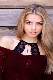 Radiant Beauty: The Allure of Marina Laswick Wallpaper