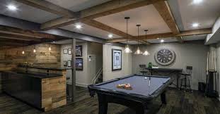 Make the curtain panels from canvas painter's drop cloths and attach large grommets to the top edge. Top 70 Best Finished Basement Ideas Renovated Downstairs Designs