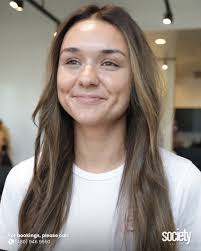 Shorter. Fuller. Seamless. Extra-long extensions, refined into a soft,  natural blend. ✨ First time at Society Salon? Enjoy 20% off your first  visit — your sign to finally book that refresh. 💇‍♀️