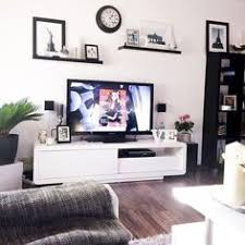 The Shelves But In White Above Tv With Plants On And Pictures And Trinkets Home Living Room Tv Decor Living Room Tv Wall