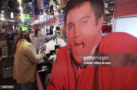 Amy Fogarty, from New York, looks through music CDs at a gift shop... News  Photo