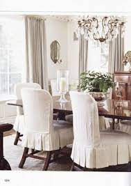 A slipcover is a fixed cover that may be slipped off and on a piece of padded furniture which main function is to protect the padded furniture. Option For Dining Room Chairs Instead Of Replacing For Upholstered Ones Dining Room Chair Slipcovers Dining Room Chair Covers Luxury Dining Room