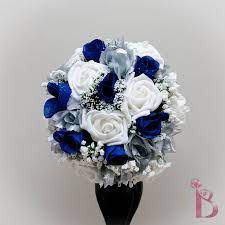 Add in a deep accent color, like red, to offer hints of contrast. Pin By Fawna Playforth On Wedding Inspiration Wedding Bridal Bouquets Bridal Bouquet Royal Blue Wedding