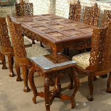 A round table and four matching armless chairs come included in this set. Teak Wood Dining Table Set Color Black Brown Inr 2 65 Lac Set By Smart Tech Solution From Saharanpur Uttar Pradesh Id 3426502