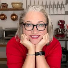 Kristi Noem's awful MAGA hair extensions are a tangled mess of desperation,  held together with blind loyalty and cheap adhesive.