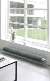 The Halo Radiator Is Floor Mounted Which Means It Can Sit In Front Of Full Length Window Contemporary Radiators Designer Radiator Horizontal Designer Radiators