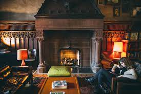 A living room with fireplace on a slanted corner wall. Halloween An Ode To Stephen King Things To Do In Chicago