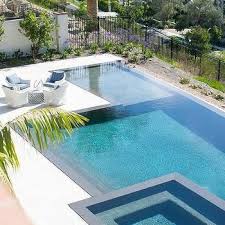 White Outdoor Chairs With Blue Border Cushions Transitional Deck Patio Pool Dream Pools Infinity Pool