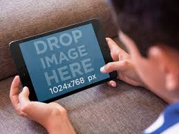 Placeit Tablet Mockup Of Boy Playing With Ipad Mini On The Couch Ipad Mini Boys Playing Ipad