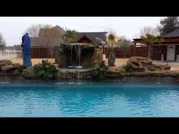 This Absolutely Stunning Rock Waterfall Grotto Is Perfect For Pools Of All Sizes Universal Rocks Mak Backyard Pool Landscaping Pool Waterfall Pool Landscaping