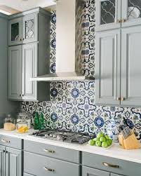 It becomes an attractive accent wall especially if the tiles have colors that contrast the colors of the countertops and kitchen cabinets. 10 Elegant Tile Backsplash Behind The Stove Ideas