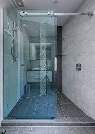 An inline shower door may be a single swinging door connected to a complete glass panel or full panels on either side of the door. Shower Doors Shower Doors Shower Sliding Glass Door Bathroom Design