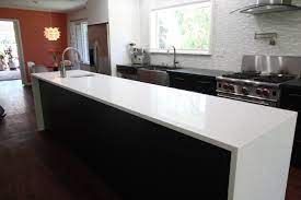 If you speak to homeowners, they'll probably tell you that there's not enough counter space in their kitchen, no matter how much or how little they have. Don T Go Chasing Waterfalls Create One This Beautiful Waterfall Countertop Is Done In Sparkling White Quar Custom Countertops Countertop Remodel Countertops