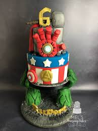 A modern design chocolate cake covered by chocolate mousse and coco spray. Marvel Cake Mel S Amazing Cakes