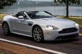 Image result for Lightning Silver 2011 Aston Martin
