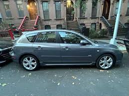 Image result for Sparkling Black 2007 Mazda3