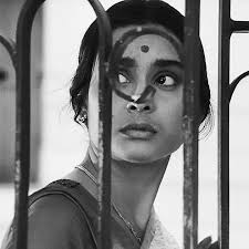 Madhabi Mukherjee in Mahanagar- The Big City (1963), a Bengali feminist drama directed by Satyajit Ray. Madhabi plays Arati, a Calcutta housewife who begins working as a saleswoman and eventually becomes the