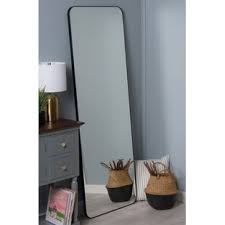 A centrally pivoted cheval mirror with gilded bronze mounts; Modern Floor Full Length Mirrors Allmodern