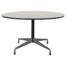 My husband and i recently bought our first (and hopefully only) house and we needed a new dining room table and chairs. Eames Herman Miller Universal Base Round Table Off White Laminate Top For Sale At 1stdibs