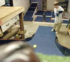 I will be hitting off concrete. Stroke Of Inspiration Richmond Heights Man Builds Mini Golf Course In Basement Suburban Journals Of Greater St Louis Stltoday Com