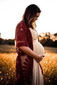 Light pink or hot pink off the shoulder maternity shoot dress: 500 Pregnant Belly Pictures Download Free Images On Unsplash