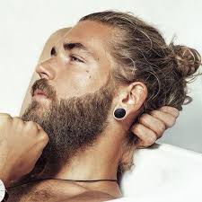The hair is lifted into a high, messy afro updo, while the bandana is tied around the head so that the pop of color is just peeking through. 35 Best Man Bun Hairstyles 2021 Guide
